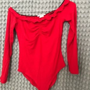 Off the shoulder red bodysuit